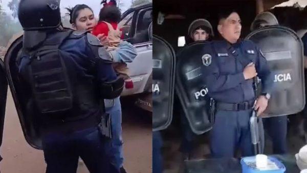 Operativo policial en Santiago del Estero durante el cual efectivos con escudos antimotines intervienen junto a una mujer que sostiene a una niña en brazos